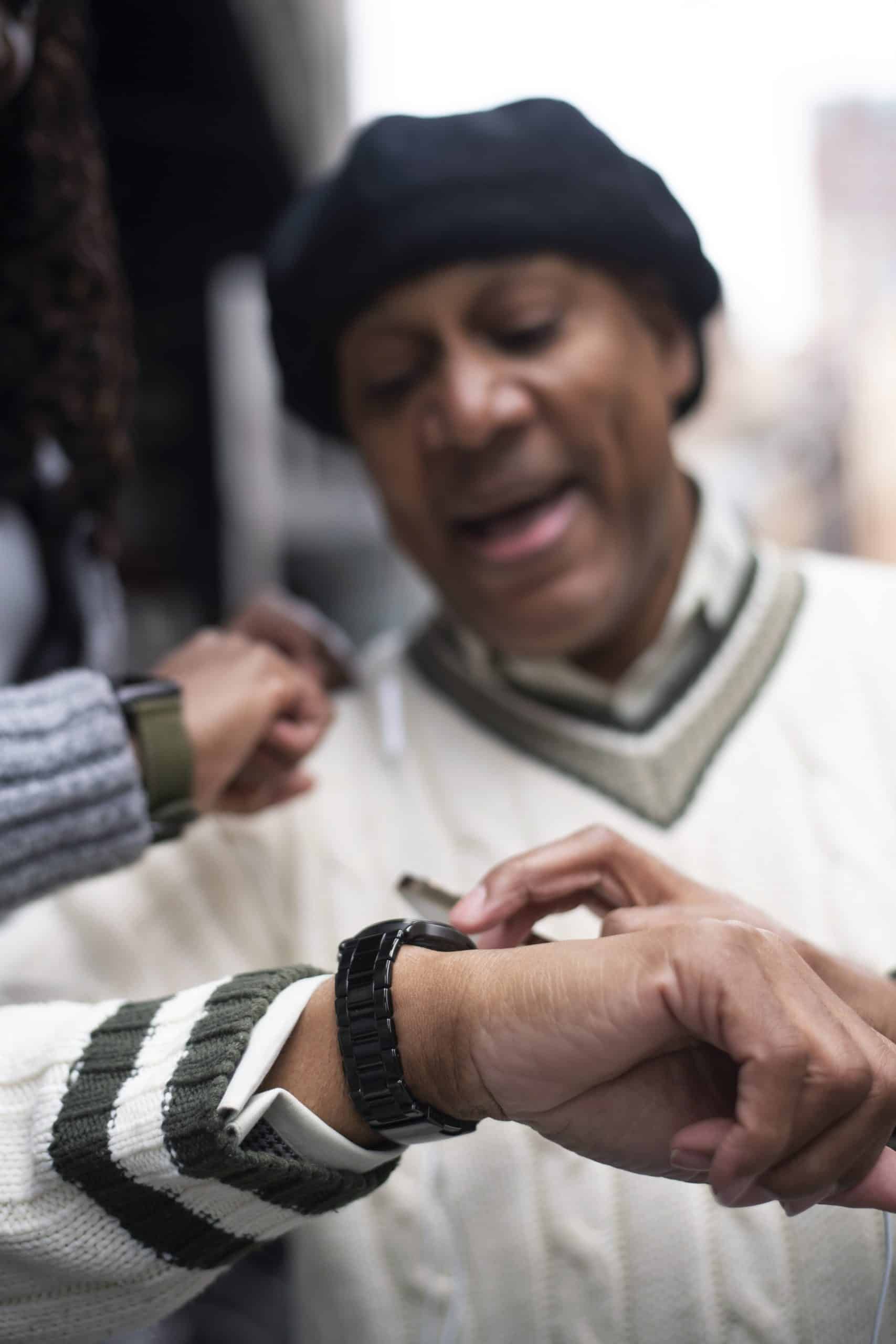 man-using-technology-while-traveling-city Respite Care for Family Caregivers